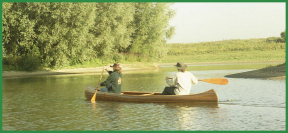 Canadese kano Soshone zijaanzicht wegvarend